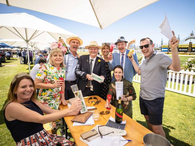 Punters enjoy their trackside position. Picture: Jason Edwards