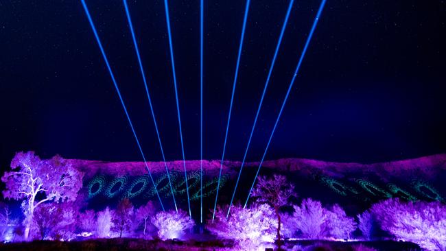 The MacDonnell Ranges lit up in 2024, part of the biggest Aboriginal lights festival in Australia and the only Aboriginal light festival of its kind in the world.