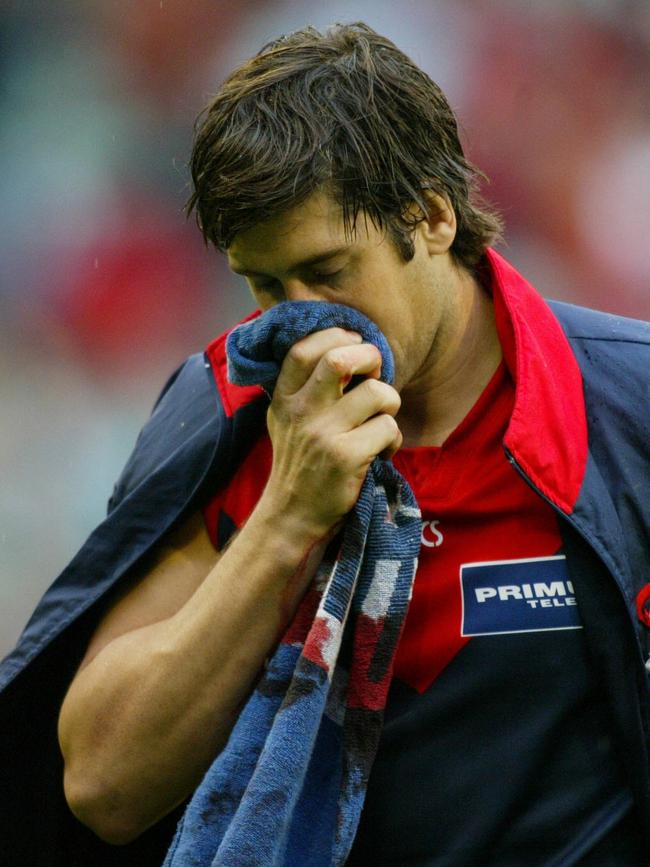 White holds his bloodied nose after a kick to the face from Steven King. Pic: Darrin Braybrook