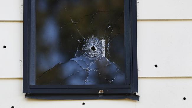 A home was sprayed with bullets in a dramatic drive-by shooting.