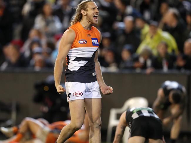 Nick Haynes rejoices as the final siren sounds in the preliminary final. Picture: Michael Klein