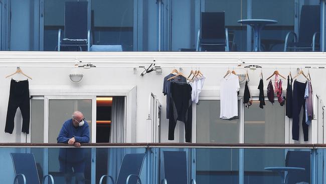 A passenger on a balcony of the Diamond Princess cruise ship, quarantined in Japan amid a coronavirus outbreak on board.