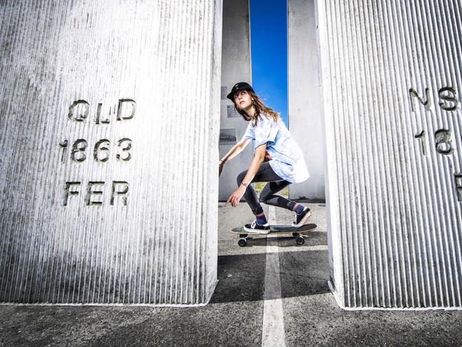 Police checking people at the Queensland border. Jessie-Lee Sorenson, 23, of Tweed Heads, New South Wales skates across the border at Twin Towns.Picture: NIGEL HALLETT