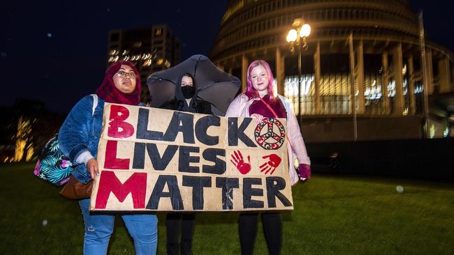 New Zealand protesters hold a vigil against the killing of Minneapolis man George Floyd in a Black Lives Matter rally outisde Parliament in Wellington on Monday. Picture: AFP