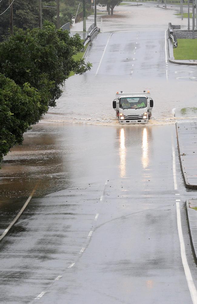 Gold Coast City Council rescue truck patrols Somerset Drive at Mudgeeraba which was closed by Gold Coast City Council Officers due to flooding which fully submerged the road overnight. NCA NewsWire / Scott Powick