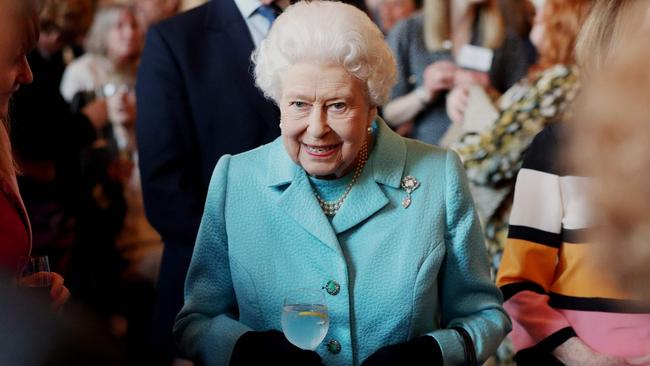 TOPSHOT - Britain's Queen Elizabeth II hosts a reception to mark the 100th Anniversary of the National Council for Voluntary Organisations (NCVO) at Windsor Castle on April 2, 2019. - NCVO represents a diverse community of over 14,000 member organisations – a third of the voluntary sector workforce in England. (Photo by Jonathan Brady / POOL / AFP)