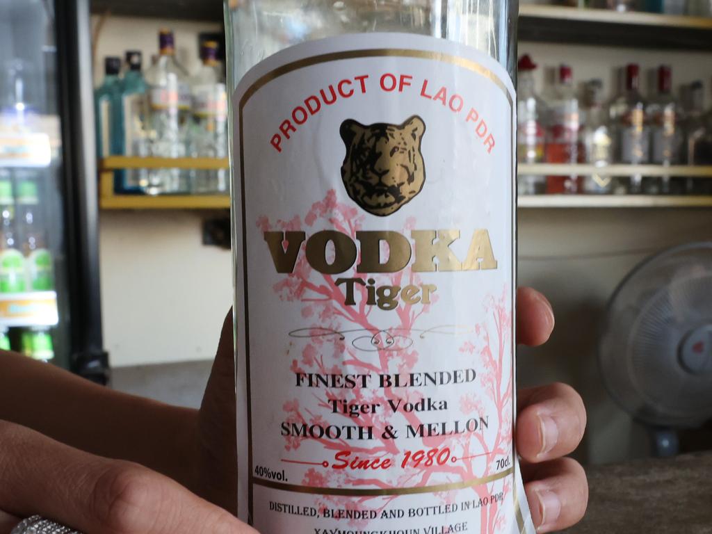 Nana Backpackers Hostel bar tender holds the same vodka the Melbourne teenagers had.