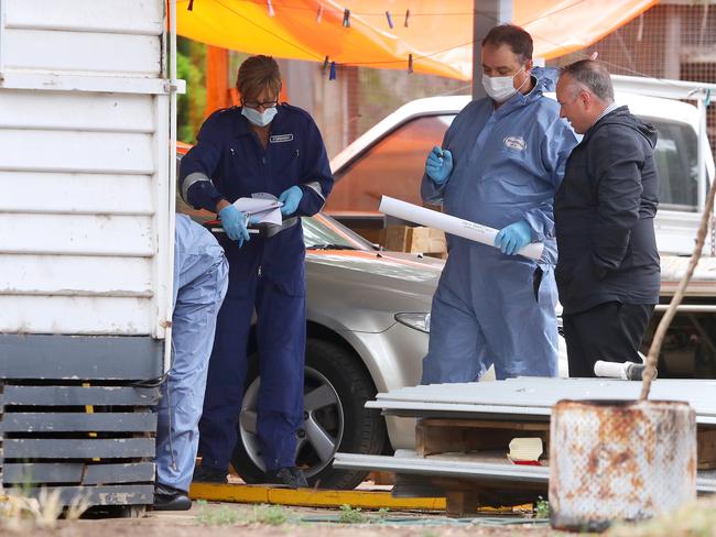 Police investigating at a house on Patullos Rd, Lara where a man was killed. Picture: Alison Wynd