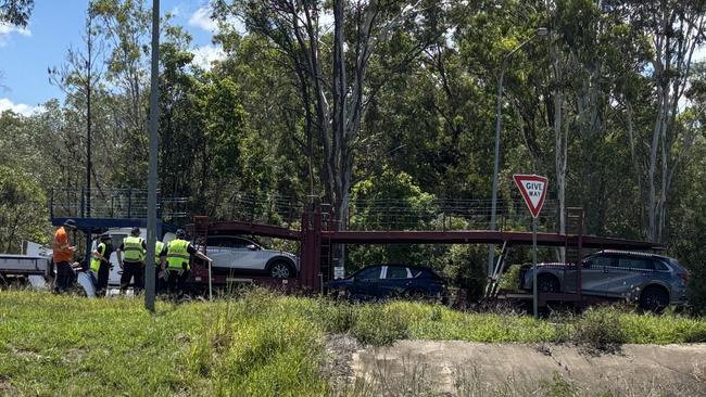 Bruce Highway exit blocked after truck vs. car crash