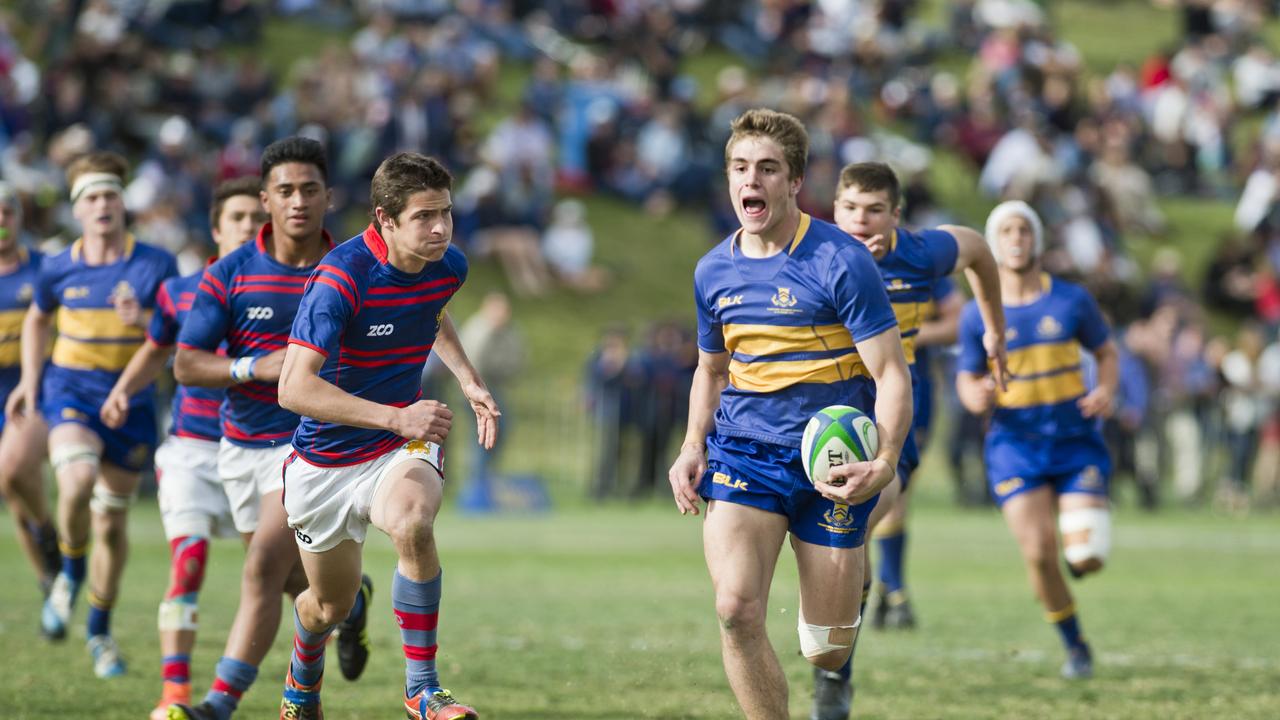 Downlands' Daniel Kiss unable to stop Samuel Stanford from scoring a try. O'Callaghan Cup, Downlands vs TGS. Saturday, 9th Sep, 2017.