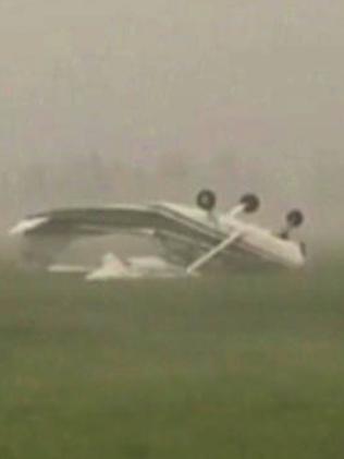 A light plane is overturned by the high wind speed from Cyclone Debbie, Bowen - Photo Supplied Channel 9