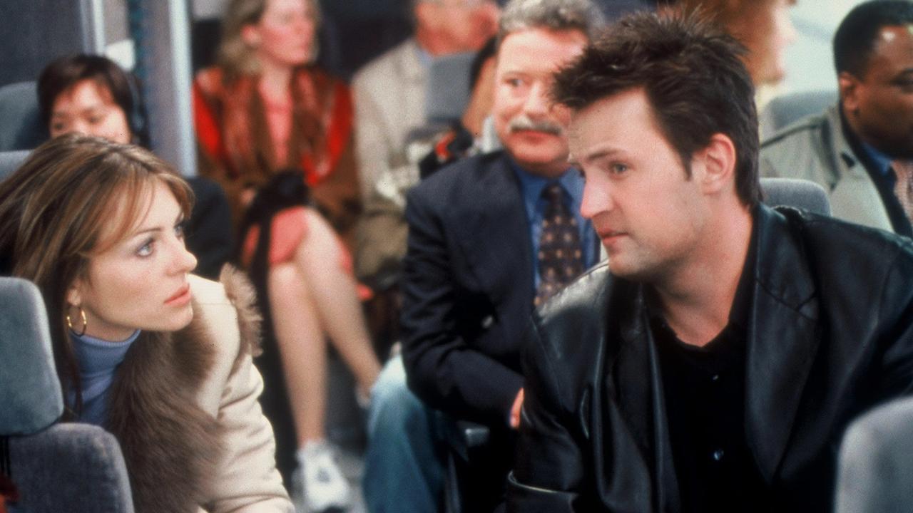 Liz Hurley and Matthew Perry in scene from film Serving Sara. Picture: Supplied