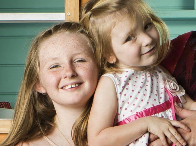 Kaitlin Relf, 9 rescued her young sister Tara-Belle, 3, after her family were trapped in flood waters south of Brisbane earlier this year. Kaitlin has been nominated for a Pride of Australia award. Photographed with mum Andrea Relf at their Munruben home. Photo Mark Cranitch.