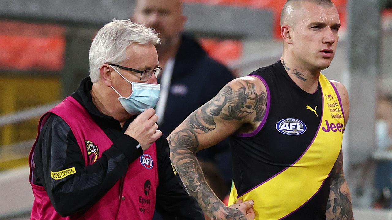 Dustin Martin goes off injured. Picture: Michael Klein