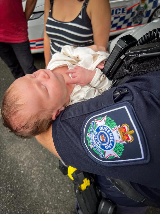 Constables Jacob Pennisi and Philippe Stigner were returning from morning callouts when they were flagged down by Nathaniel Pedler, whose wife Julie was in labour. Photo: Queensland Police Service