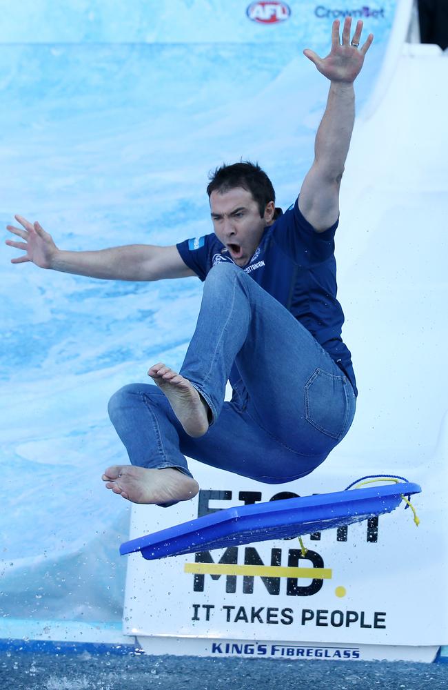 North Melbourne coach Brad Scott dressed as his brother Geelong coach Chris Scott. Picture: Michael Klein