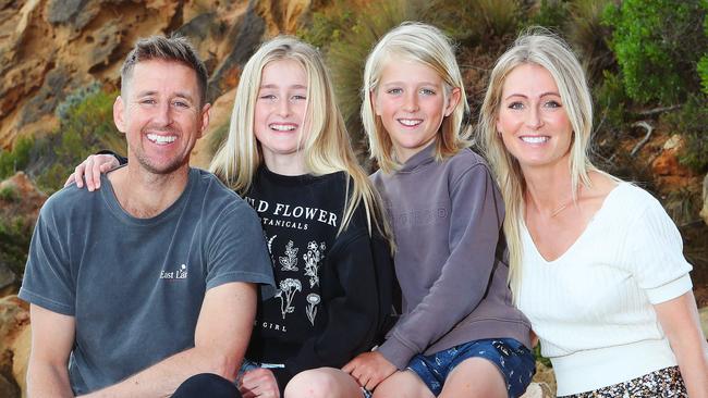 Fox Sports presenter Mark Howard with his wife Erica and two children Skye, 11, and Mack, 9, in Barwon Heads. Picture: Rebecca Michael