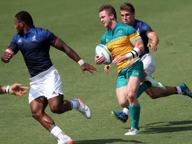 Cameron Clark in action during the 2016 Rio Olympic Men's Rugby Sevens game between Australia and France at Deodoro Stadium, Rio. Pics Adam Head