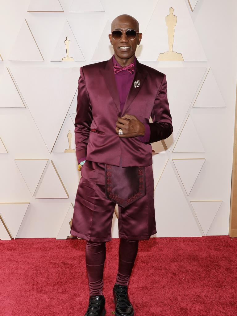 Wesley Snipes in a claret-coloured ensemble by Givenchy, comprising a jacket, shorts over leggings, and a sporran-like flag of fabric. Picture: Getty