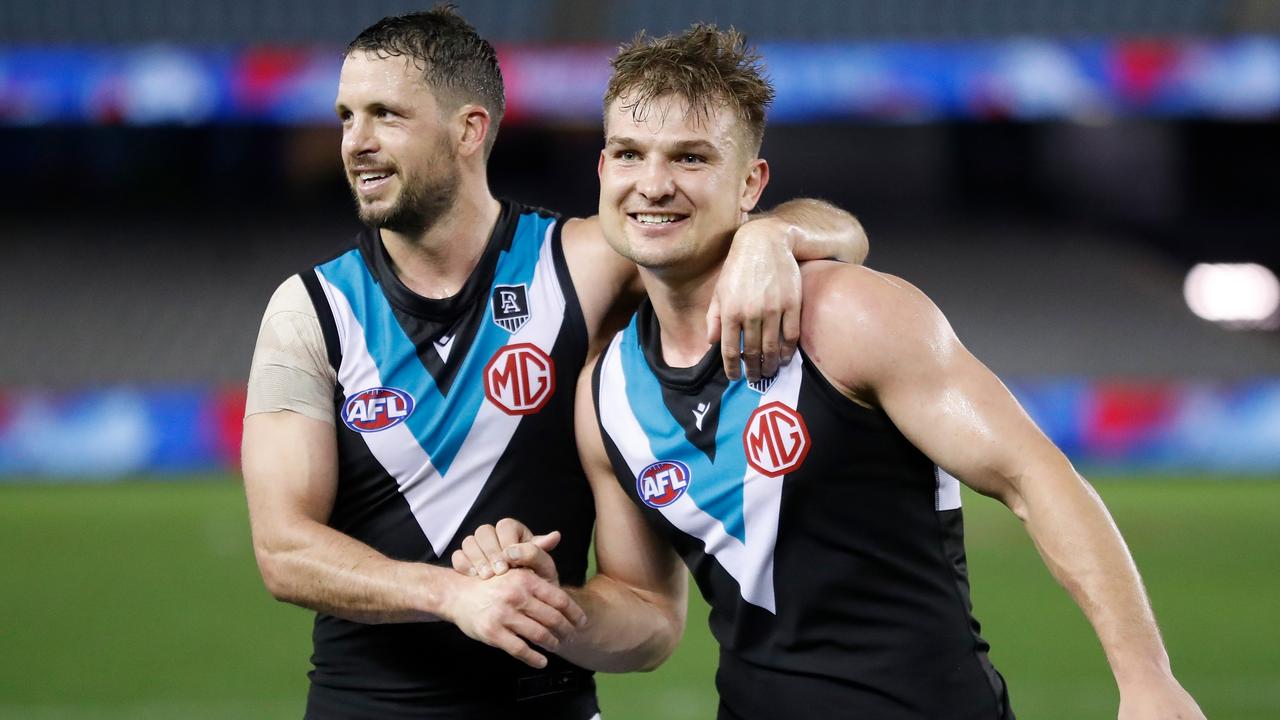 Port Adelaide midfield mainstays Travis Boak and Ollie Wines enjoy a win.