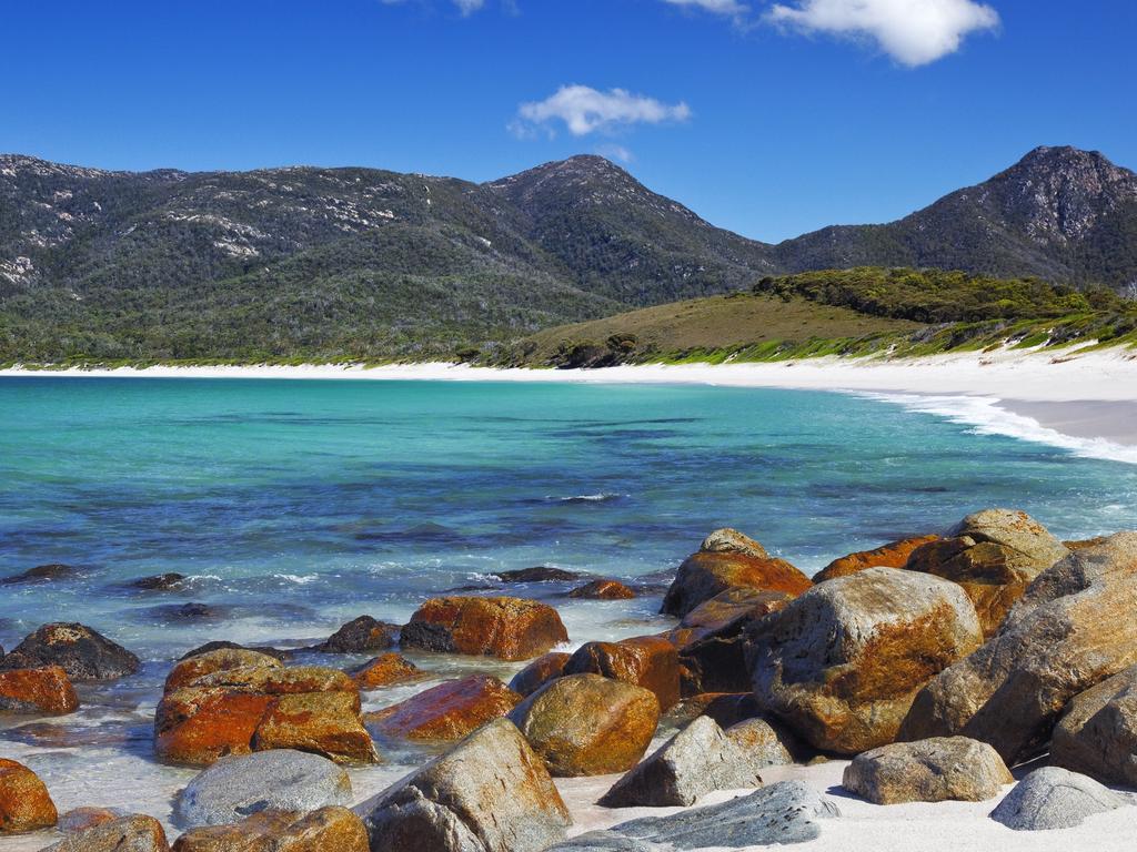 Actor Lincoln Lewis and Lisa Wilkinson from The Project hope to visit Wineglass Bay in Tasmania this year. Picture: iStock.