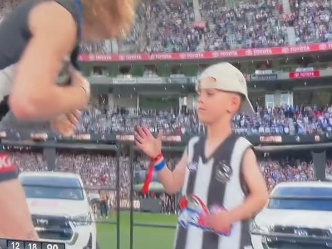 Collingwood star Beau McCreery has been slammed online over an awkward moment in front of millions at the AFL grand final presentation.