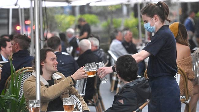 Sydneysiders enjoy a drink at the Fortune of War Hotel in The Rocks on October 11 as restrictions eased. Picture: NCA NewsWire / Jeremy Piper