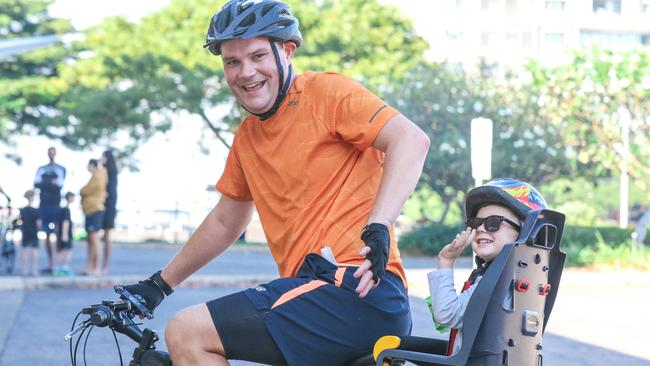 Anthony Knights and his Son Hudson 3 In the Annual Gran Fondo finishing at Darwin Waterfront. Picture: Glenn Campbell