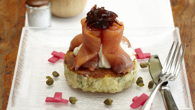 Feta and potato cake with crème fraîche, smoked salmon, red wine, onion marmalade and pickled turnips.