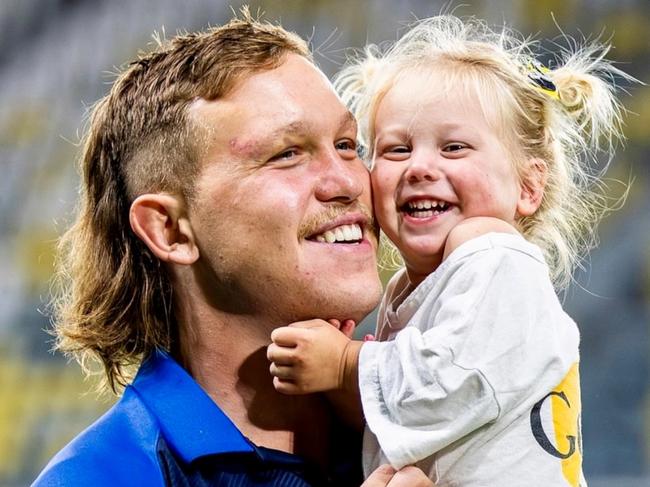 Reuben Cotter with daughter Sunny at a Cowboys game