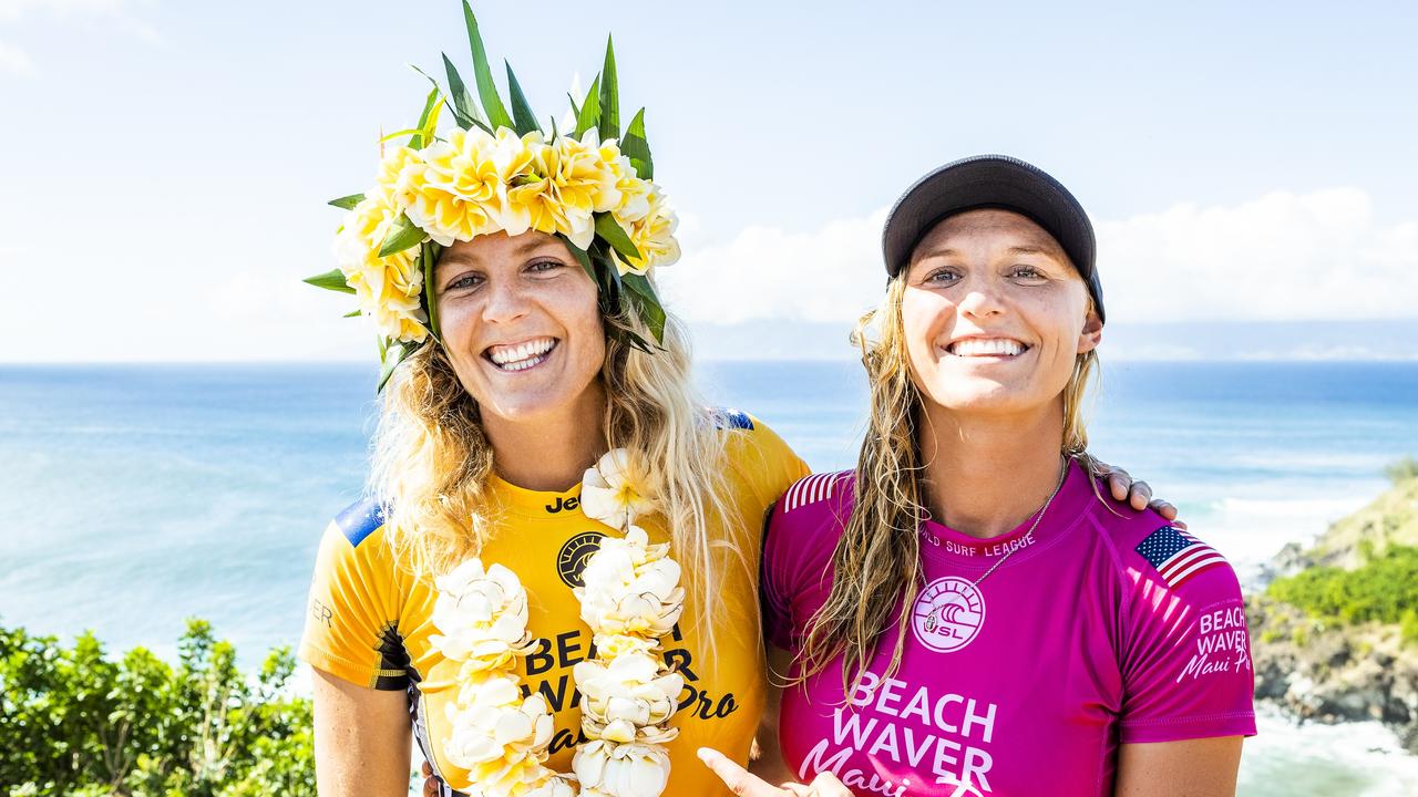Steph Gilmore (L) is congratulated by runner-up Lakey Peterson.