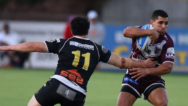 Bears halfback Jamal Fogarty tries to beat the tackle of Seagulls back-rower Kalani Going. Picture: Steve Holland