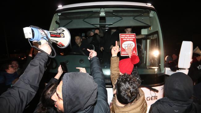 Protesters block a shuttle bus outside the La Mirage venue. Picture: David Geraghty