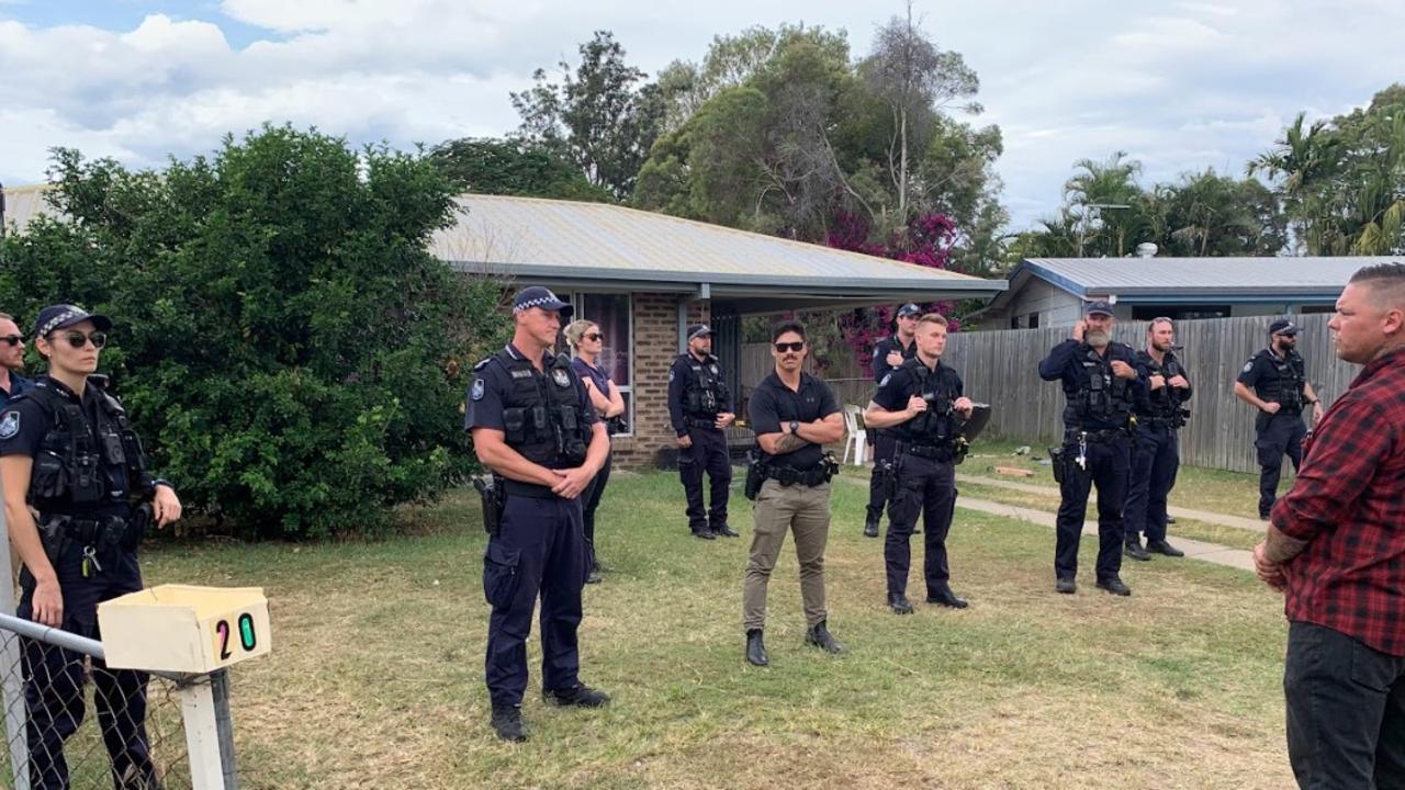 Police forced to stand between a home in Norman Gardens and up to 100 vigilantes who attended an anti-crime rally.