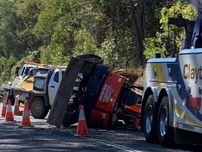 An excavator landed on the front of a Ute on the Mary Valley Highway this morning. Photos: Maddie Manwaring