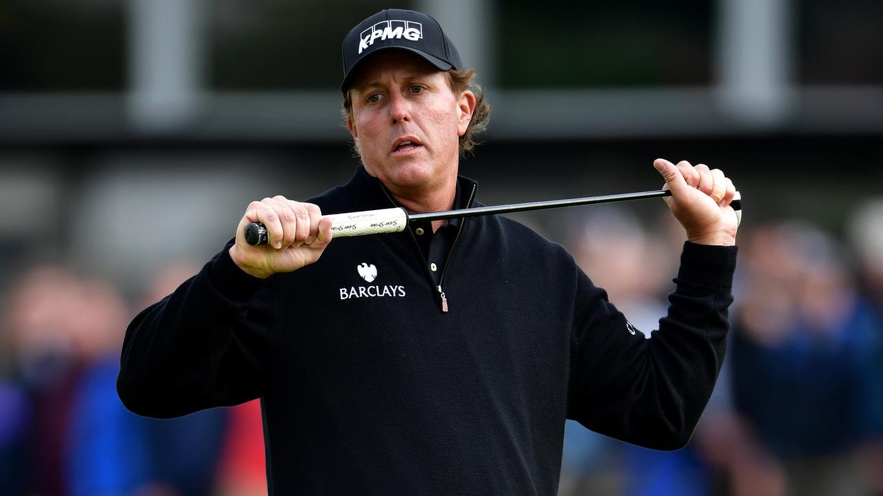 TROON, SCOTLAND - JULY 17: Phil Mickelson of the United States reacts after a missed eagle chance on the 16th green during the final round on day four of the 145th Open Championship at Royal Troon on July 17, 2016 in Troon, Scotland. (Photo by Stuart Franklin/Getty Images)