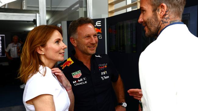 David Beckham talks with Red Bull Racing Team Principal Christian Horner and Geri Horner. Mark Thompson/Getty Images/AFP