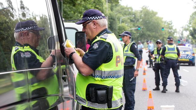 Police breath test drivers on Alexandra Avenue on New Year’s Day. Picture: Mark Dadswell