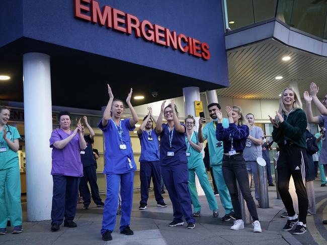 NHS staff applaud themselves and their colleagues at the entrance of the Royal Liverpool Hospital as part of the “Clap For Our Carers” campaign. Picture: Getty Images