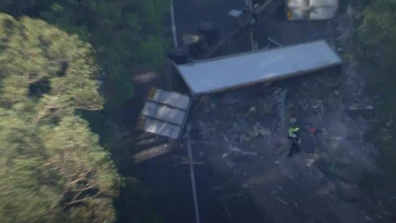 Drone footage shows the scene of a double fatal truck rollover on the Cunningham Highway at Tregony. Images: ABC News