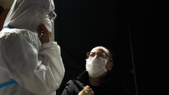 A doctor speaks to a patient in Toulouse, France Picture: Zuma Press