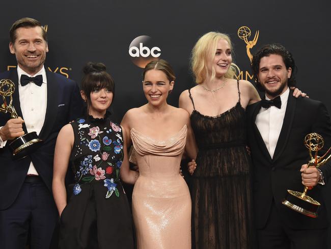 Nikolaj Coster-Waldau, from left, Maisie Williams, Emilia Clarke, Sophie Turner, and Kit Harington winners of the award for outstanding drama series for Game of Thrones at the Emmy Awards. Picture: AP