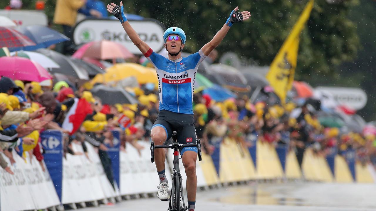 BERGERAC, FRANCE - JULY 25: Ramunas Navardauskas of Lithuania and Garmin-Sharp celebrates as he crosses the finish line to win the nineteenth stage of the 2014 Tour de France, a 208km stage between Maubourguet Pays du Val d'Adour and Bergerac, on July 25, 2014 in Bergerac, France. (Photo by Doug Pensinger/Getty Images)