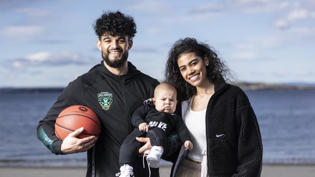 Sam McDaniel and his partner Lashai Howard and son Malakhi on his first day out of quarantine at Kingston Beach. Picture: Eddie Safarik