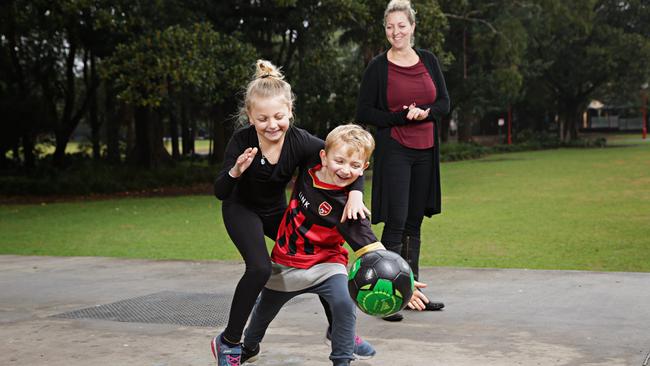 Lisa Hodgkins with children Olivia-Rose, 8, and James Hodgkins, 5, in Sydney. Picture: Adam Yip