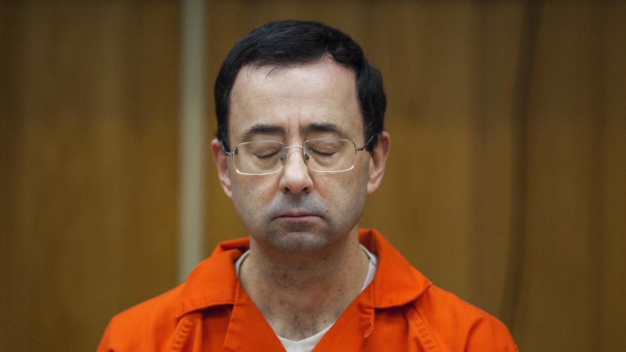 In this Feb. 5, 2018, file photo, Larry Nassar listens during his sentencing at Eaton County Circuit Court in Charlotte, Mich.