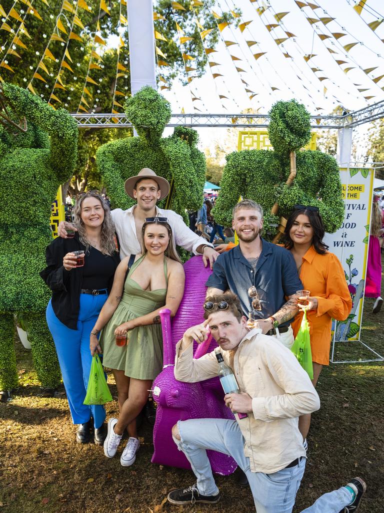 At the Festival of Food and Wine are (from left) Ada McKenzie, Gary Winthorpe, Ashante Bradofd, Jacob Sheath, Josh Adams and Bailee Ward, Carnival of Flowers 2022, Saturday, September 10, 2022. Picture: Kevin Farmer