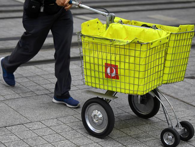 Australia Post says it will deliver on Saturdays and at later hours on weekdays in order to deal with rising demand. Picture: NCA NewsWire / Joel Carrett