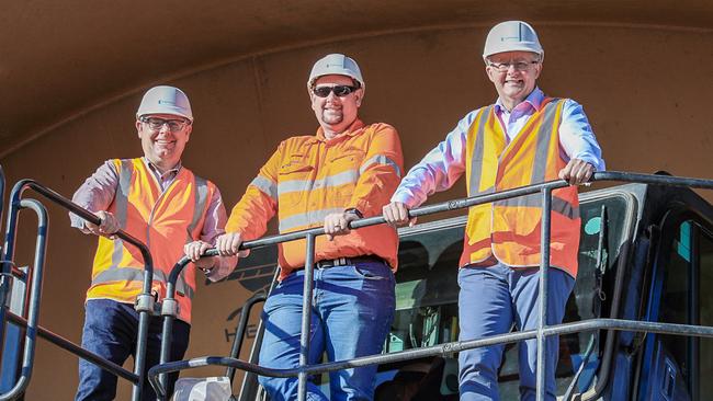 From left, senator Murray Watt, Labor’s Capricornia candidate, Russell Robertson, and Anthony Albanese.