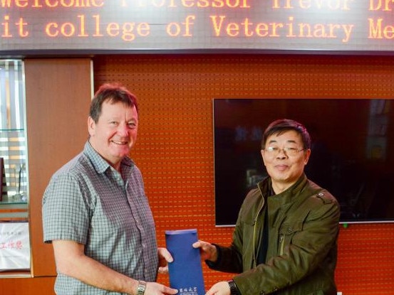 Pictures of Professor Trevor Drew (left) visiting Jilin University in China. Picture: Supplied